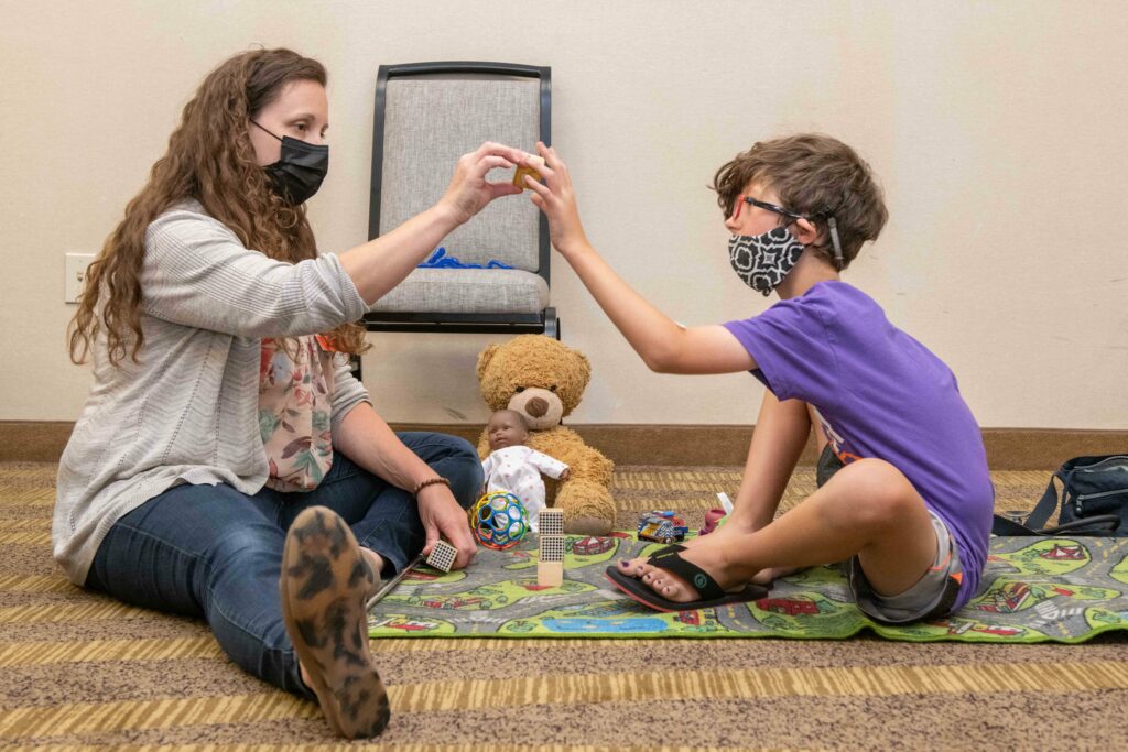 Researcher with child