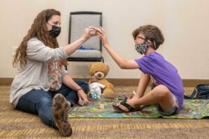 Researcher with child