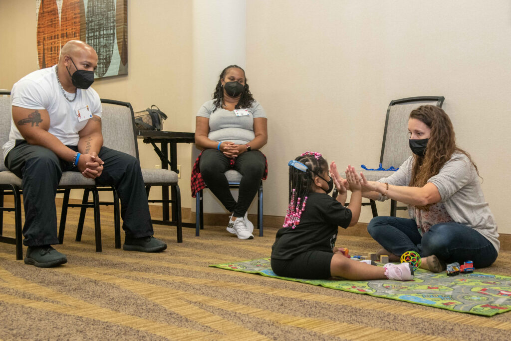 Researchers with family