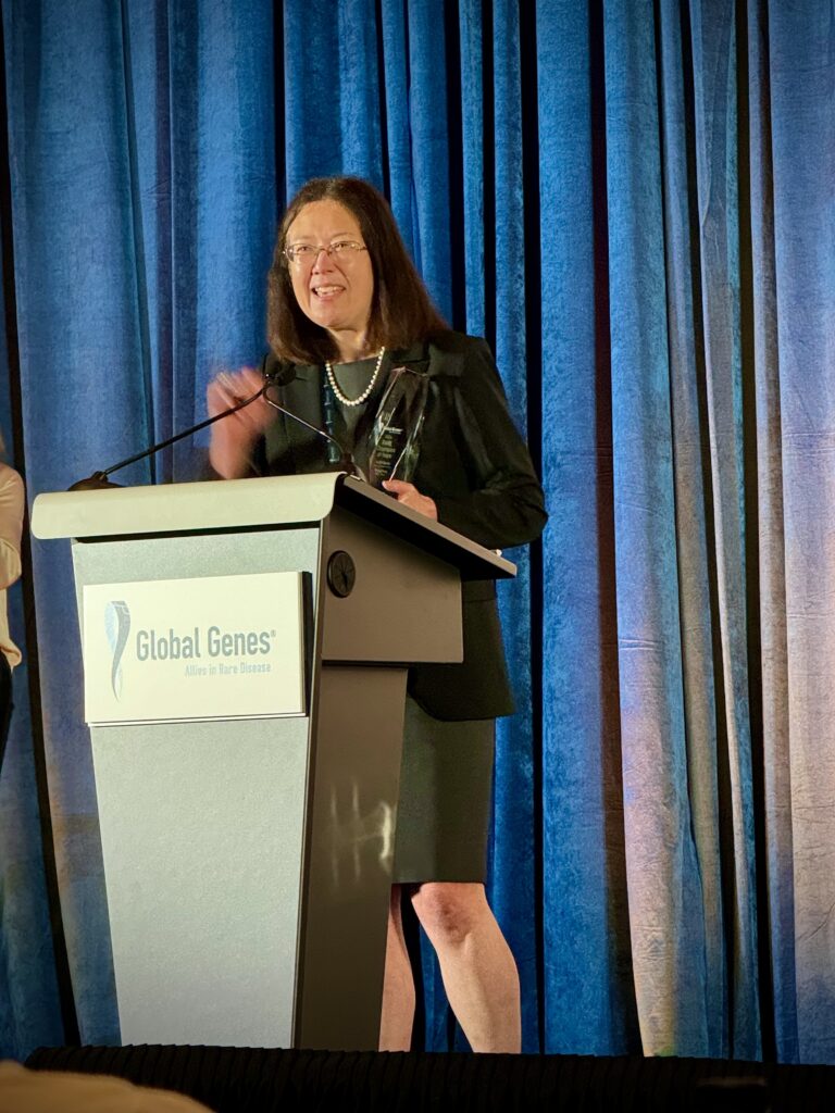 Dr. Chung accepting the award at the Global Genes ceremony
