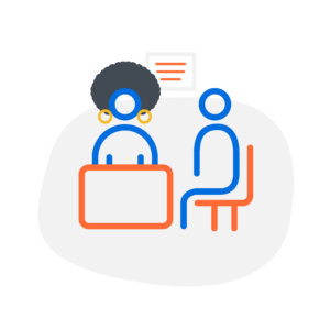 Woman sitting at desk with person